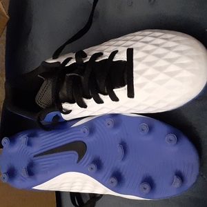 Nike youth soccer cleats. New, blue size 1y.